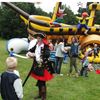 opblaasbare Bewegend Springkussen Piratenschip spectaculaire piratenattractie van Happy Rent