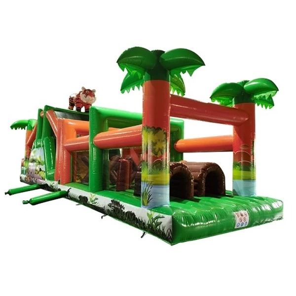 Opblaasbare Stormbaan Jungle 14 meter met palmbomen en tropische obstakels